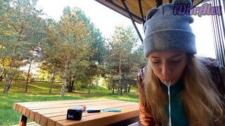 handjob and blowjob in a public park from a smoking blonde